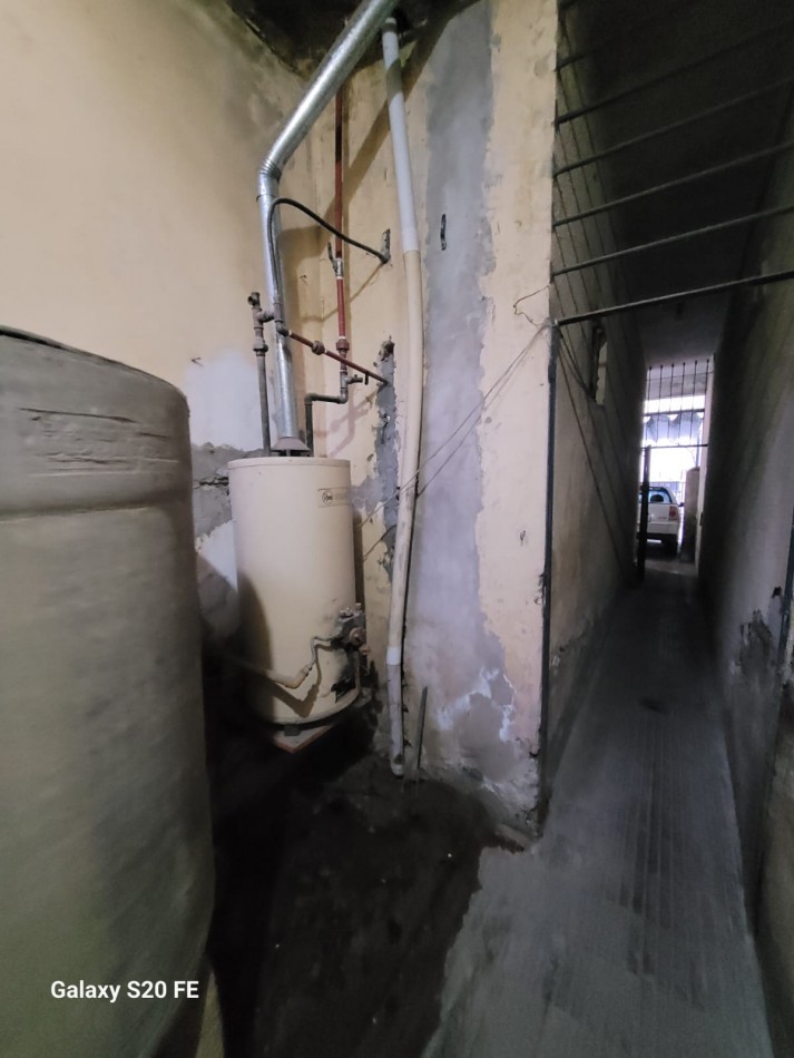 CASA CON DEPARTAMENTO EN VENTA